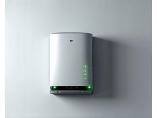 Modern solar inverter mounted on a wall with glowing indicator lights